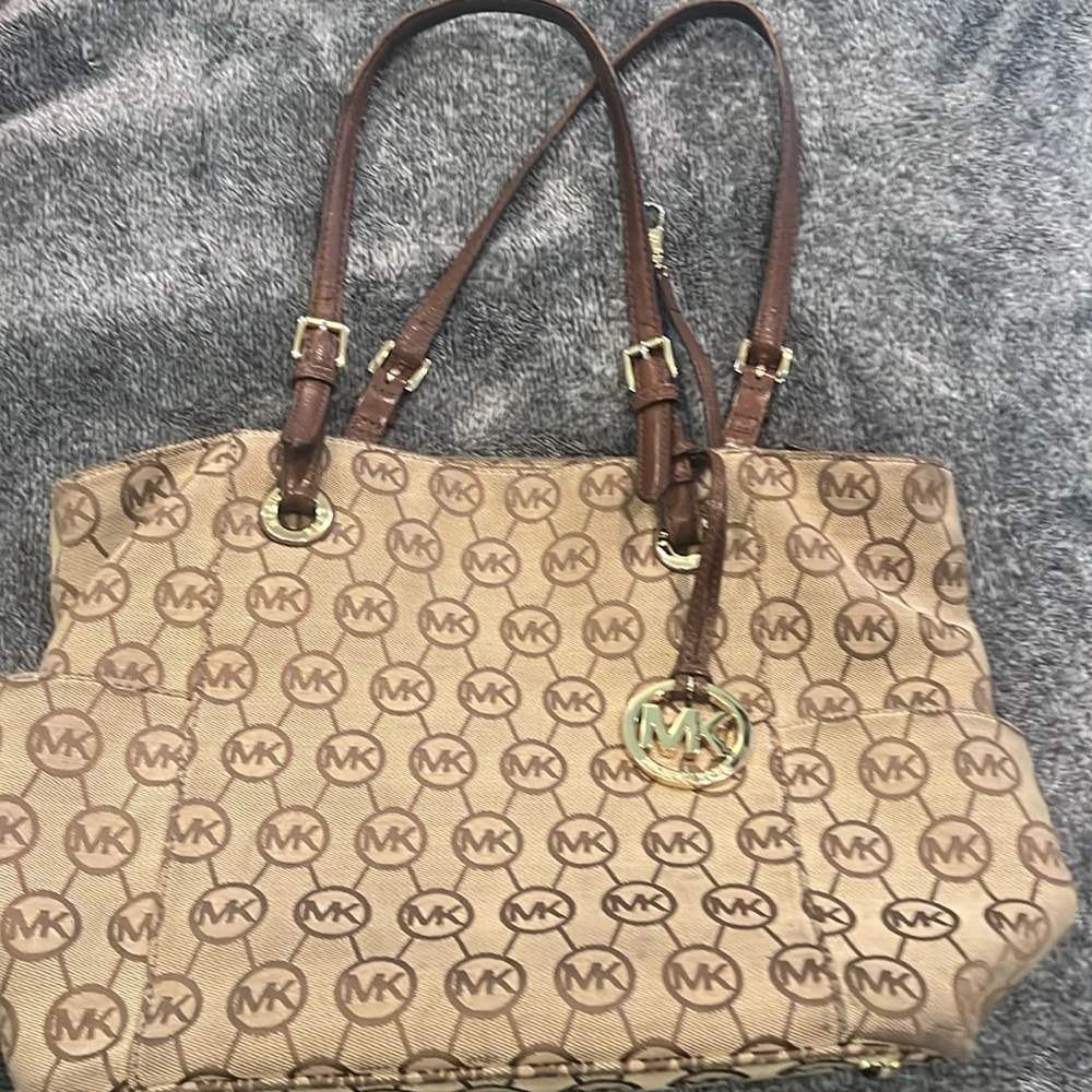 Reposh: used MK canvas purse. Non-smoking home goods condition.